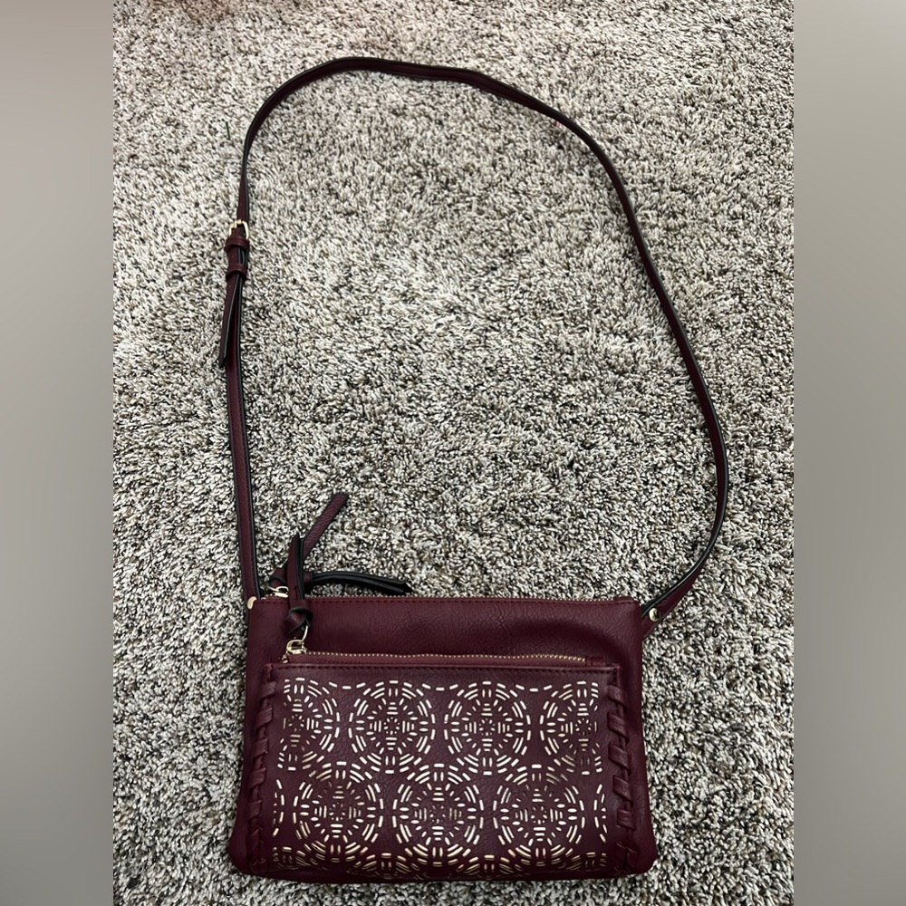 Not sure the brand but very cute purse